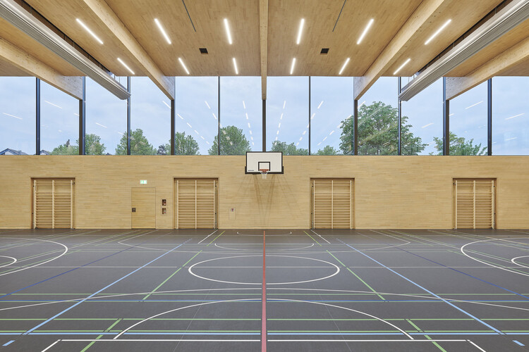 Спортивный зал в den Breitwiesen / THOMA.  КЛАСТЬ.  БЮХЛЕР.  Architekten - Интерьерная фотография, Дерево