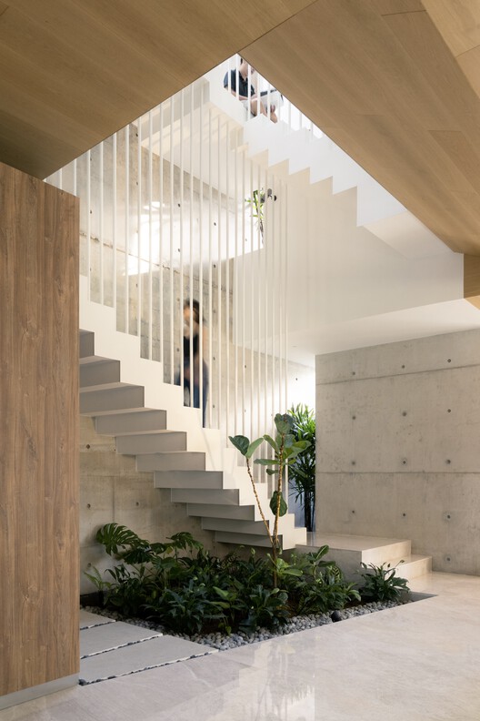 Дом в Терубке / CDG Architects - Фотография интерьера, лестница, фасад, балка
