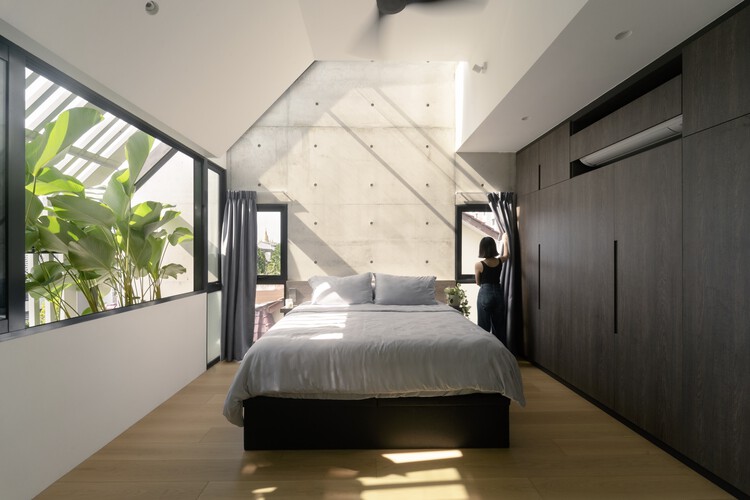 Дом в Терубоке / CDG Architects — фотография интерьера, спальня, кровать