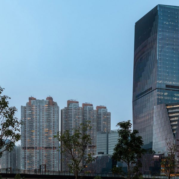 Snøhetta представляет небоскреб со скошенной кромкой на месте старого аэропорта Гонконга