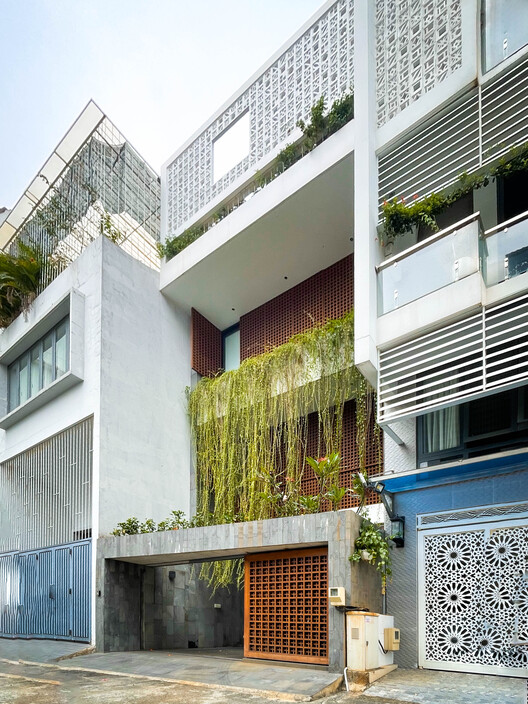 Дом из ткани / Lam Nin Architects + 90odesign - Фотография экстерьера, фасада
