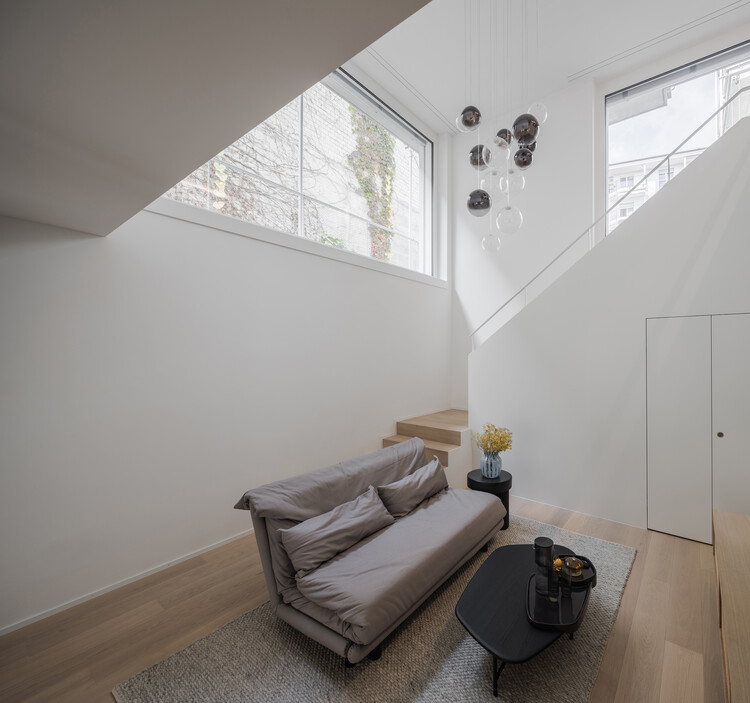 Landskronhof Apartments / HHF Architects — Фотография интерьера, гостиная, окна