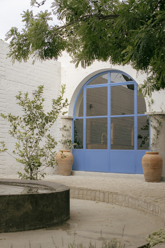 Дом Сан-Игнасио / Amarillo Amate Arquitectura - Фотография экстерьера, фасад, арка