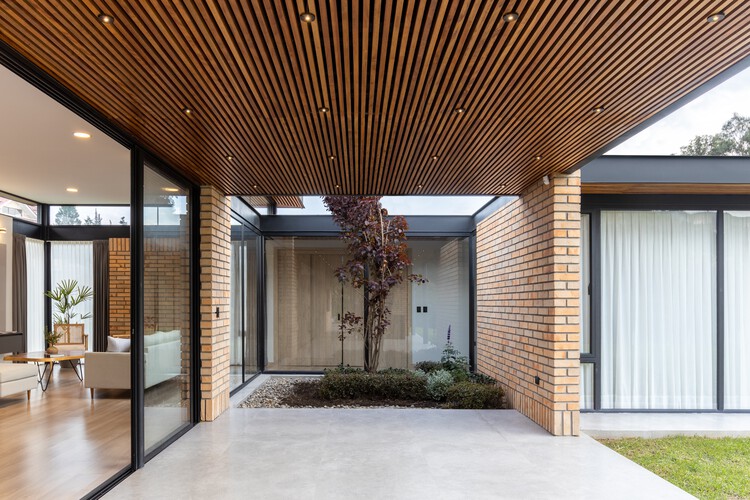 TC House / Arqcor Proyectos Arquitectura - Фотография интерьера, фасад, балка