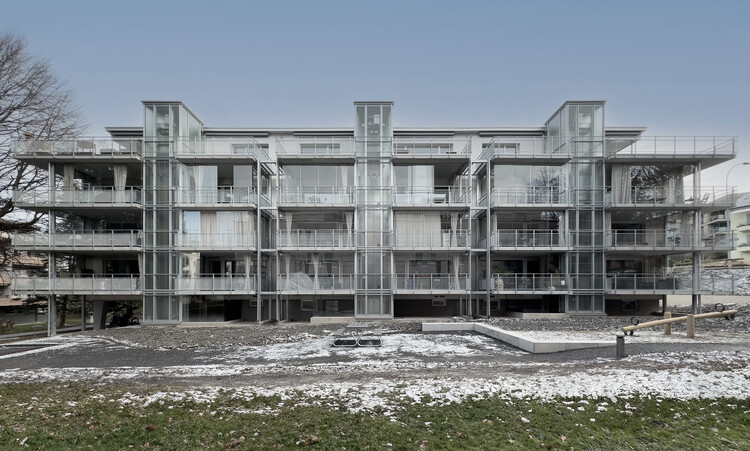 Многоквартирный дом Transformation Langensand / Galliker und Riva Architekten - Фотография экстерьера, фасад, окна