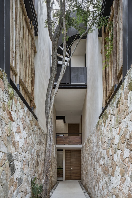 Отель Амака / AS Arquitectura + Quesnel arquitectos - Фотография интерьера, окон, фасада