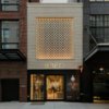 Кирпичная решетка фасада магазина Leica в Нью-Йорке от Format Architecture Office